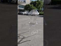 Clear resin devil chair with patterned backrest